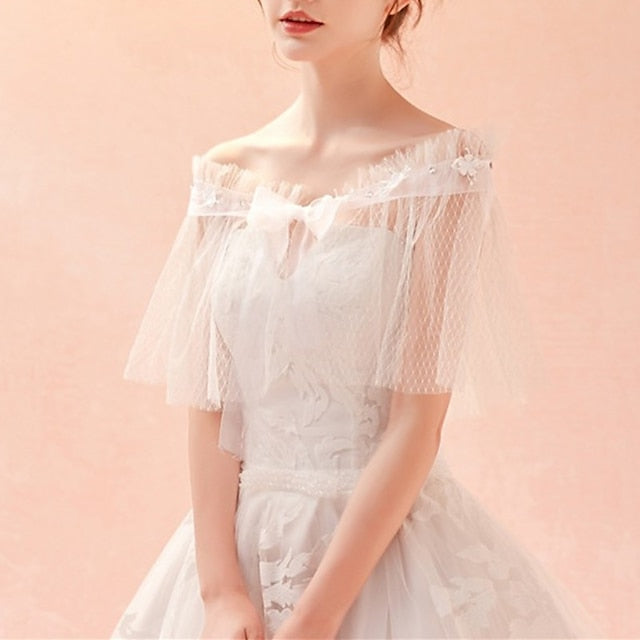 Élégante et Romantique Robe de Mariée en Tulle Sans Manches avec Nœud Papillon