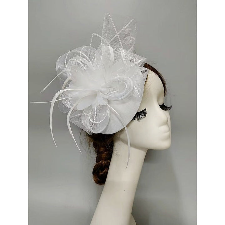Fascinator élégant voilette type soucoupe, fleur, plume et tulle