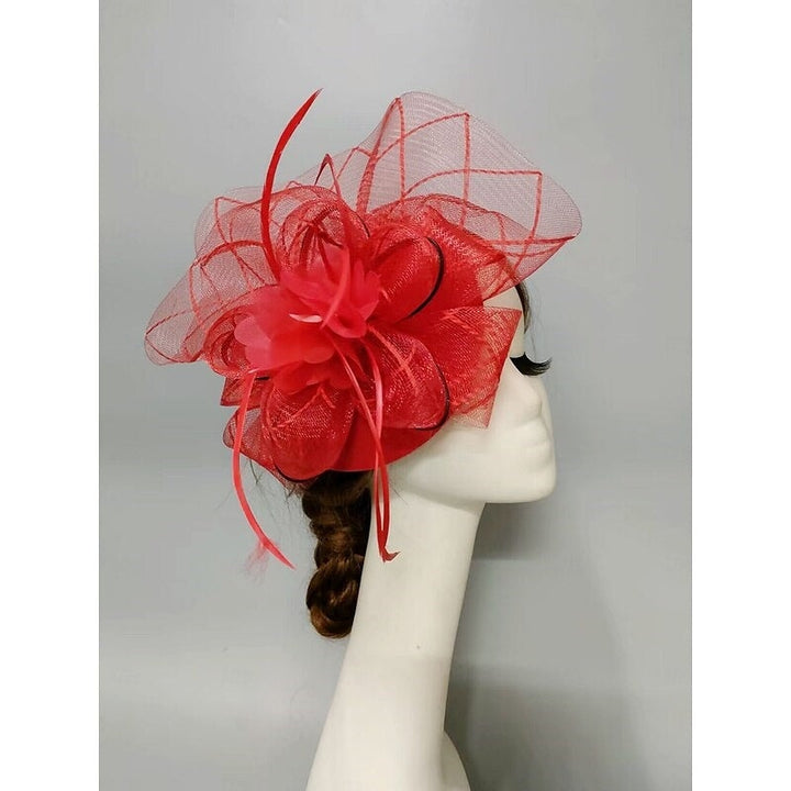Fascinator élégant voilette type soucoupe, fleur, plume et tulle