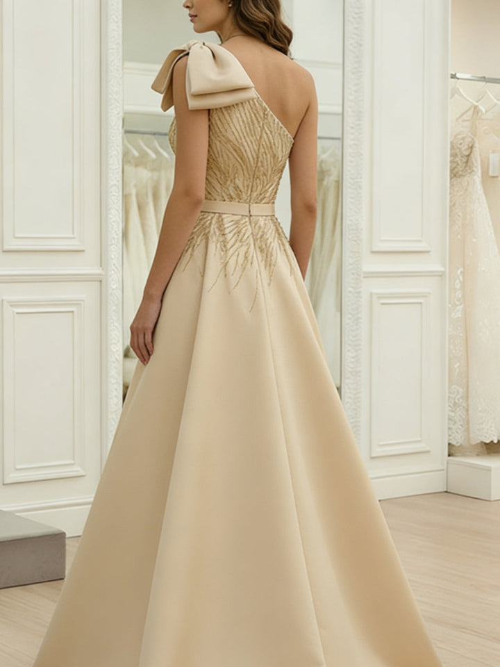 Robe soirée ligne A une épaule satin nœud sans manches sequins, longueur sol